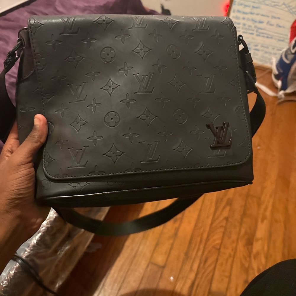Louis Vuitton Black Messenger Bag with Sophisticated Design